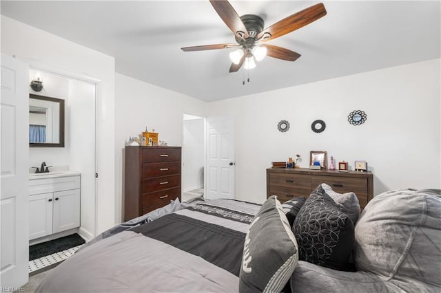 bedroom with carpet flooring, ceiling fan, and sink