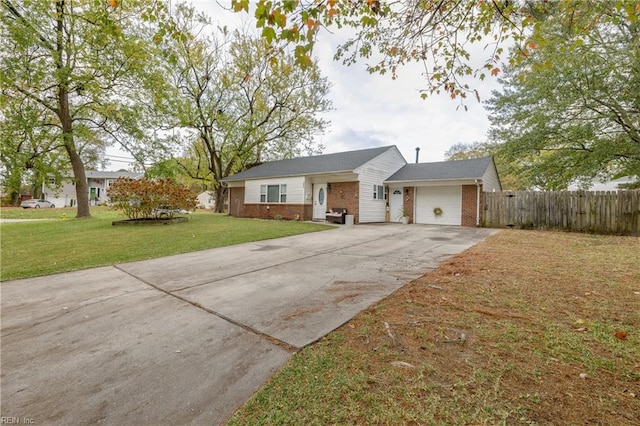 single story home with a front yard and a garage