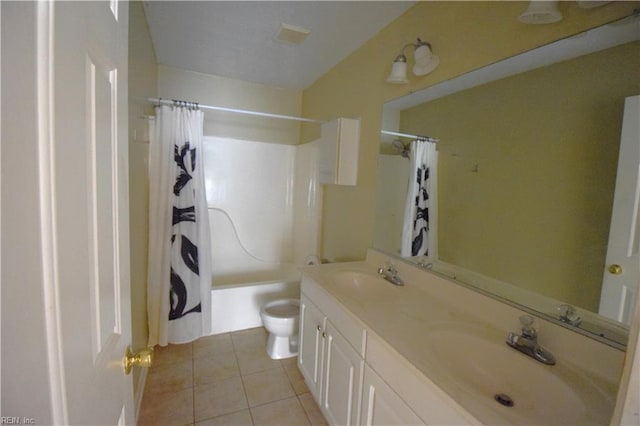 full bathroom featuring tile patterned floors, vanity, shower / bath combination with curtain, and toilet