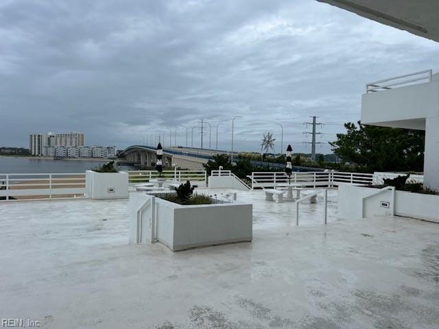 view of patio / terrace featuring a water view