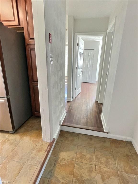 hallway featuring light wood-type flooring