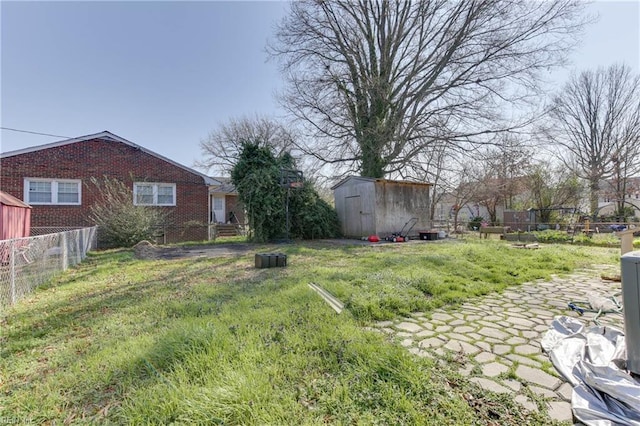 view of yard with a storage unit