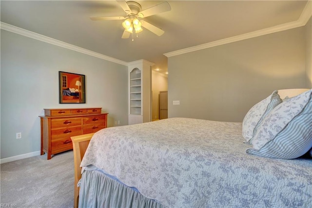 bedroom featuring carpet, ceiling fan, and crown molding