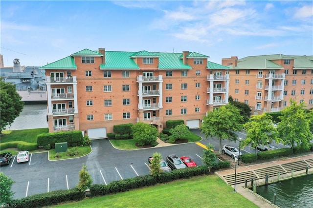 view of building exterior with a water view