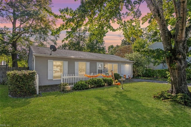 view of front of house with a lawn