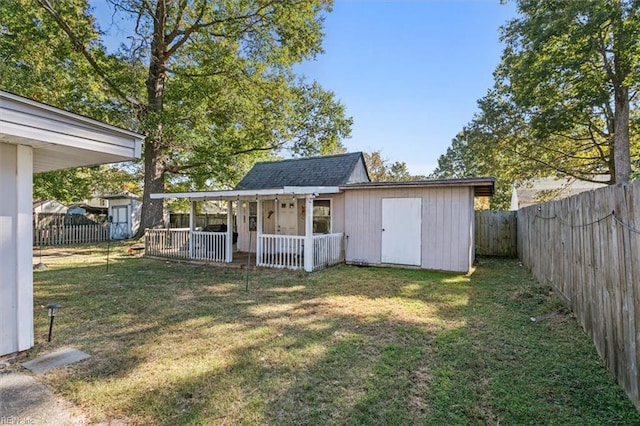 view of outbuilding featuring a yard