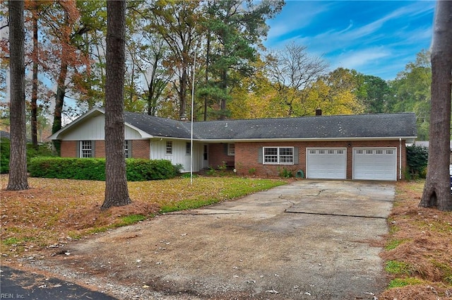 single story home with a front lawn and a garage