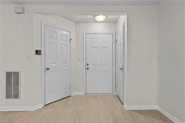 entryway with light wood-type flooring