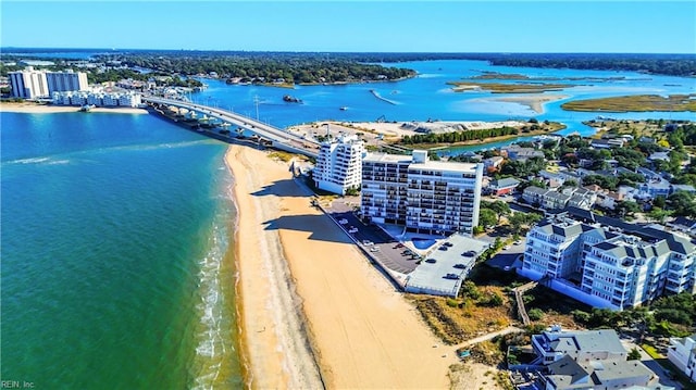 bird's eye view featuring a view of the beach and a water view