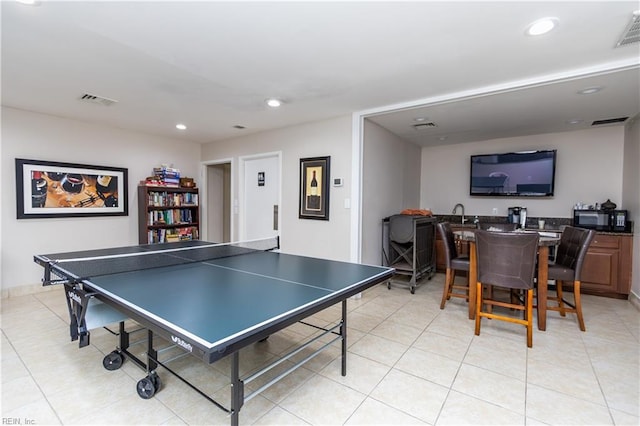 playroom with sink and light tile patterned floors