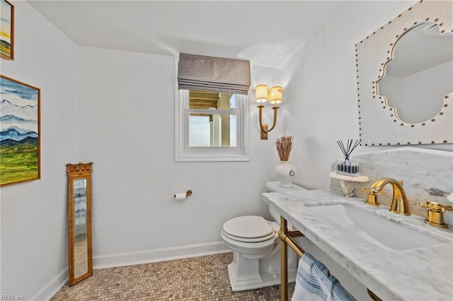 bathroom with tile patterned floors, toilet, and sink