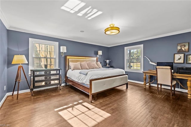 bedroom featuring dark hardwood / wood-style floors and crown molding