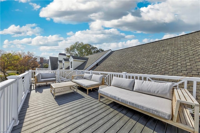 wooden terrace featuring an outdoor hangout area