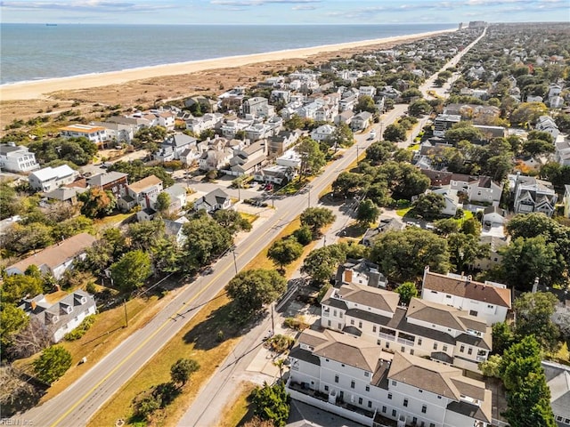 aerial view featuring a water view and a beach view