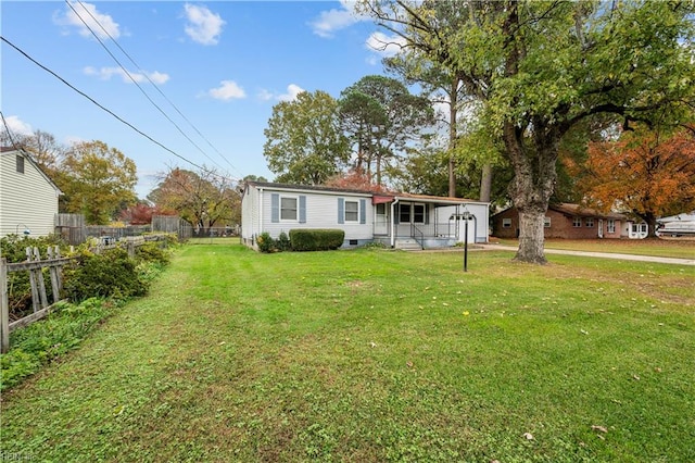 view of front of property with a front lawn