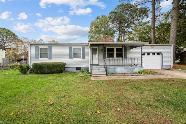 view of front facade with covered porch, a garage, and a front lawn