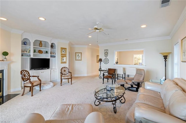 living room with ceiling fan, light colored carpet, and ornamental molding