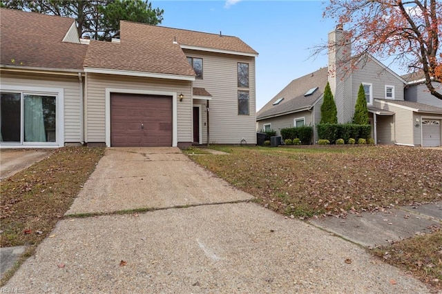 front of property with a garage