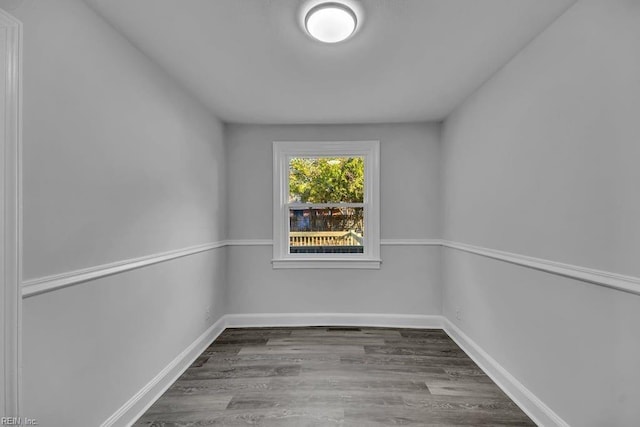 empty room with wood-type flooring