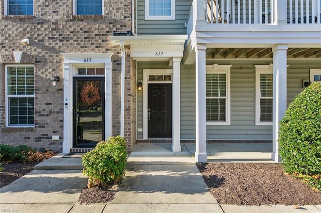 doorway to property with a balcony