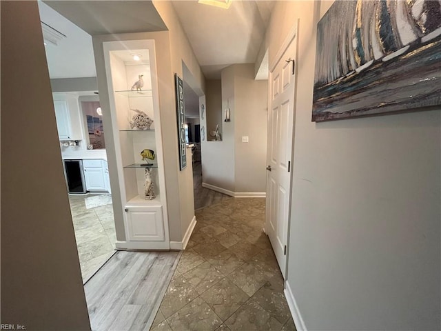 corridor featuring light hardwood / wood-style flooring