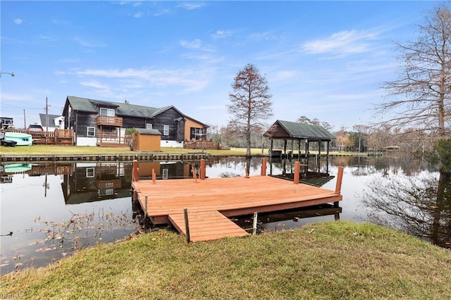 129 Arapahoe Trl, Hertford, NC 27944 - dock with a water view and a yard