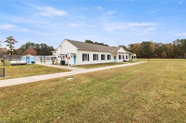 view of front of home with a front lawn