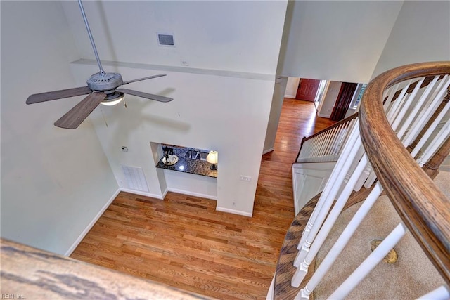 interior space featuring hardwood / wood-style flooring and ceiling fan