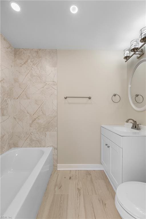 full bathroom featuring vanity, toilet, shower / bathing tub combination, tile walls, and hardwood / wood-style flooring