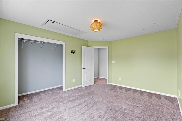 unfurnished bedroom featuring a closet and carpet