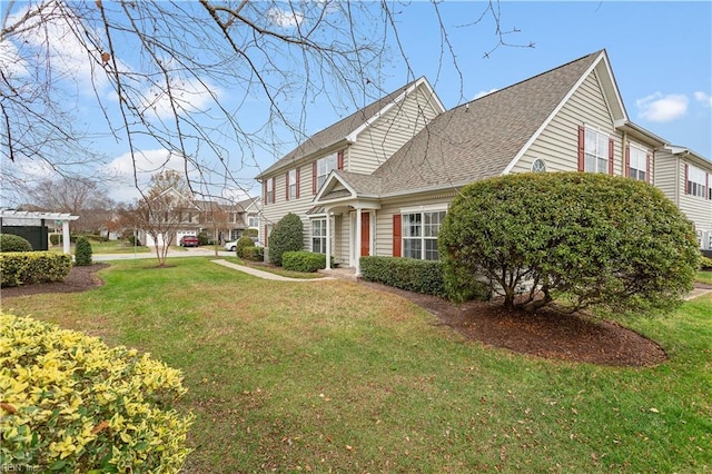 view of property exterior with a lawn