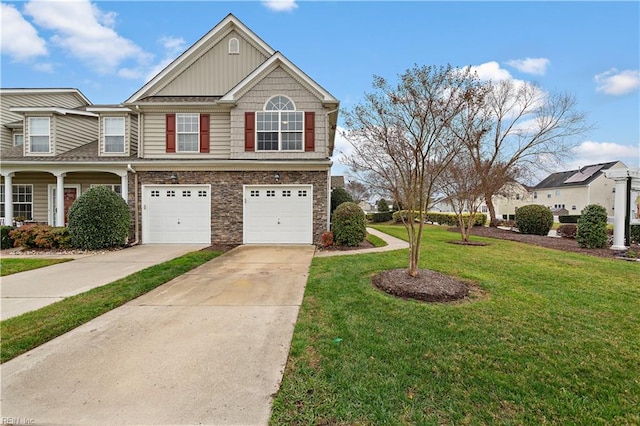 view of front of house with a garage and a front yard