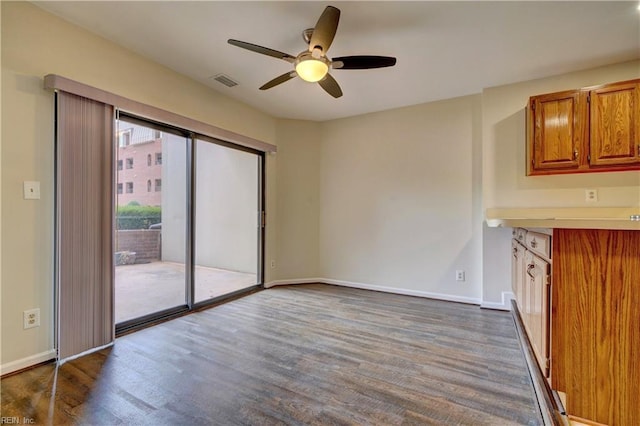 interior space with hardwood / wood-style flooring and ceiling fan