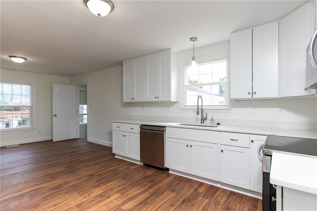 kitchen with white cabinetry, plenty of natural light, stainless steel appliances, and decorative light fixtures