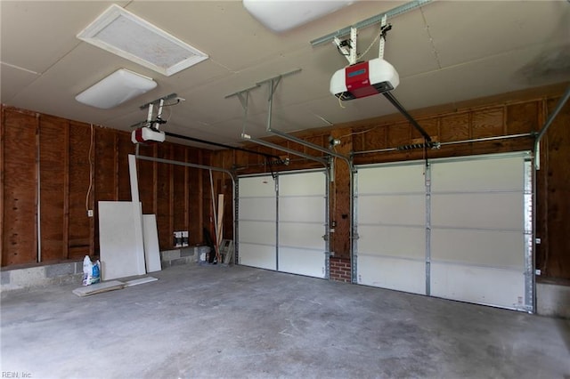 garage featuring a garage door opener