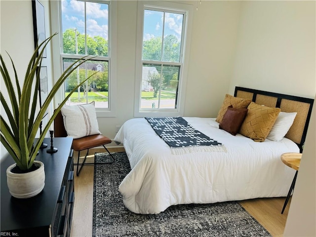 bedroom featuring hardwood / wood-style floors