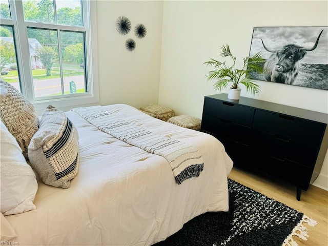 bedroom featuring hardwood / wood-style flooring