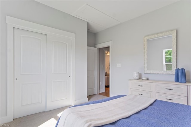 carpeted bedroom featuring a closet