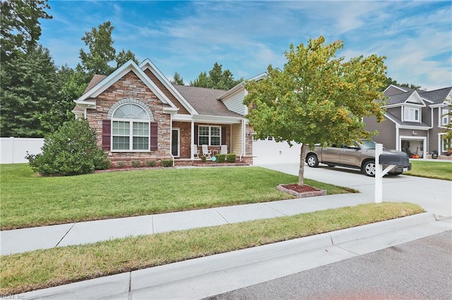 view of front facade featuring a front yard and a garage