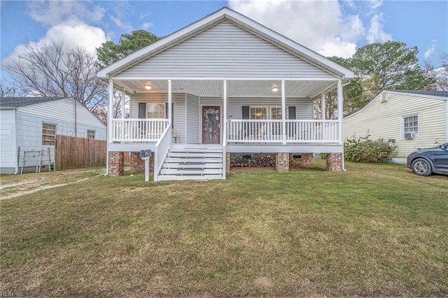 bungalow-style house featuring a front lawn and a porch