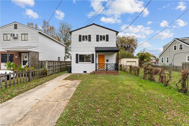 view of property featuring a front lawn