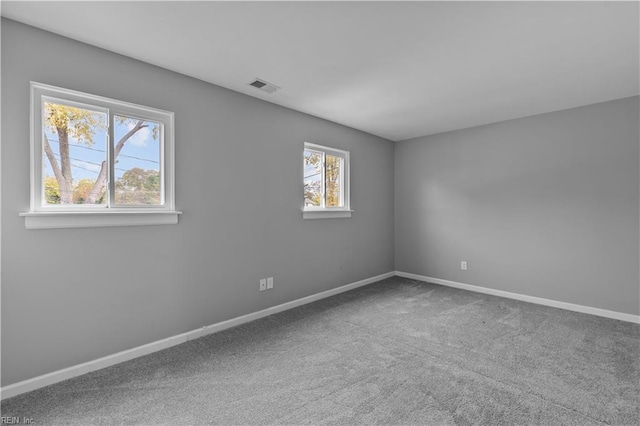 spare room with carpet flooring