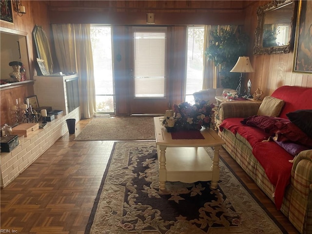 living room with dark parquet flooring