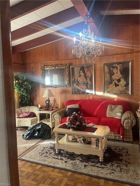 sitting room featuring parquet floors, beam ceiling, and wooden walls