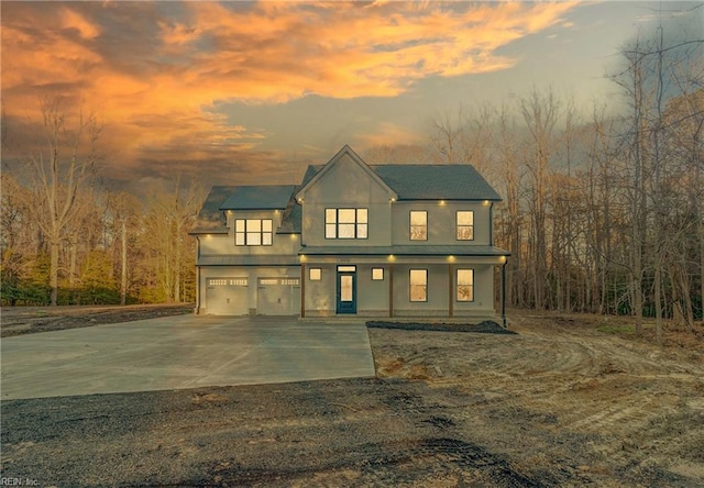 view of front of property featuring a garage