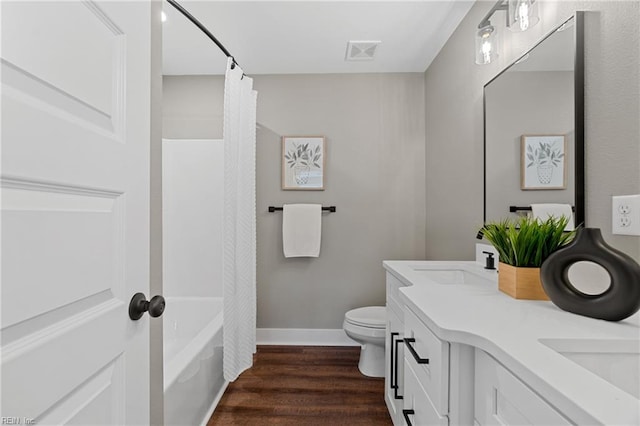 full bathroom with shower / bathtub combination with curtain, vanity, toilet, and wood-type flooring