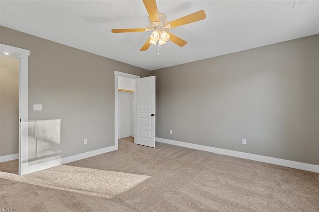 unfurnished bedroom with ceiling fan and light carpet