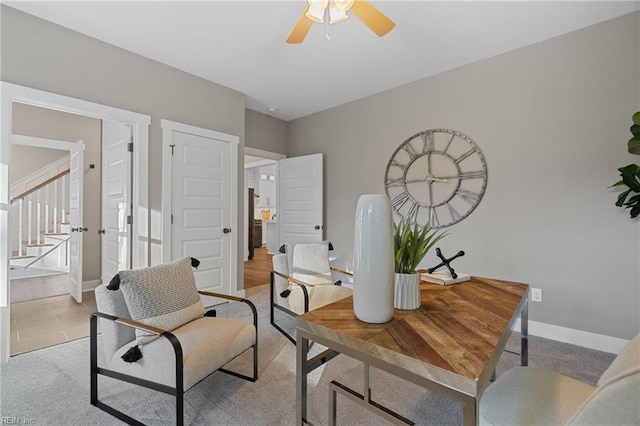 home office with ceiling fan and light wood-type flooring