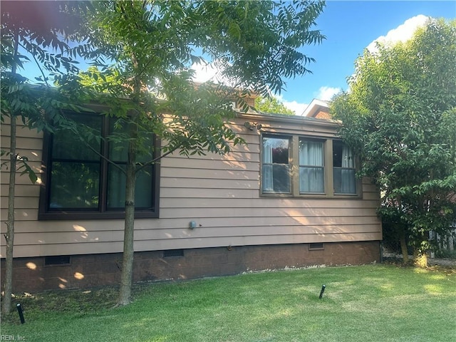 1049 Brandon Ave, Norfolk, VA 23507 - view of property exterior featuring crawl space and a yard