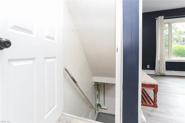 stairway featuring hardwood / wood-style floors